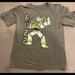 Disney Shirts & Tops | Buzz Lightyear Grey T Shirt Boys Size 10/12. | Color: Gray | Size: Lb