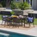 Uma Outdoor 7-Piece Rectangle Foldable Wicker Dining Set with Umbrella Hole by Christopher Knight Home