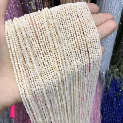 Perles de coquillages naturelles blanches petites perles de nacre à facettes pour la fabrication de