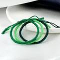 Bracelet tressé en fil vert pour hommes et femmes tissé à la main corde porte-bonheur Bracelets