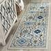 Blue/White 26 x 0.37 in Area Rug - Charlton Home® Osakis Floral Ivory/Blue Area Rug, Polypropylene | 26 W x 0.37 D in | Wayfair ANDO7157 43522859