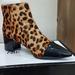 Nine West Shoes | Ankle Print Boots | Color: Black/Orange | Size: 6.5