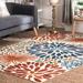 Blue/Orange 90 x 0.2 in Area Rug - World Menagerie Weyland Floral Power Loom Indoor/Outdoor Patio Rug | 90 W x 0.2 D in | Wayfair