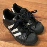 Adidas Shoes | Adidas Black Shell Toe Superstar Shoes Size 1.5 | Color: Black/White | Size: 1.5b