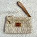 Michael Kors Bags | Michael Kors Wristlet | Color: Cream/Gold | Size: 8x4.75