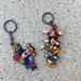 Disney Accessories | 2 Vintage Disney Parks Rubber Keychains | Color: White/Silver | Size: Os