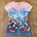 Disney Tops | Disney’s Magic Kingdom Characters Shirt | Color: Silver/White | Size: S