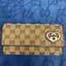 Gucci Bags | Gucci Gg Canvas And Leather Lovely Heart Wallet | Color: Brown | Size: 4”X1”X7.5”