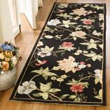 Black 30 x 0.59 in Indoor Area Rug - Lark Manor™ Hollander Floral Handmade Looped/Hooked Wool Area Rug Wool | 30 W x 0.59 D in | Wayfair