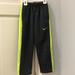 Nike Bottoms | Nike Boys Size 5 Gray Pant W/ Bright Yellow Strip With Pockets Therma-Fit Pants | Color: Gray/Yellow | Size: 5b