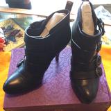 Coach Shoes | Coach Tessie Black Leather Heeled Booties Size 9b, Pre-Owned | Color: Black/Silver | Size: 9
