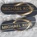 Michael Kors Shoes | Brand New! Michael Kors Logo Womens Flip Flops | Color: Black | Size: 8