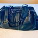 Coach Bags | Coach Leather Handbag With Buckles- Black | Color: Black | Size: Os