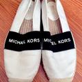 Michael Kors Shoes | Michael Kors Canvas Slip On Shoes | Color: Black/White | Size: 7