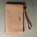 Coach Bags | Authentic Coach Clutch Nwt Tan And Pink With A Heart Charm | Color: Pink/Tan | Size: Os