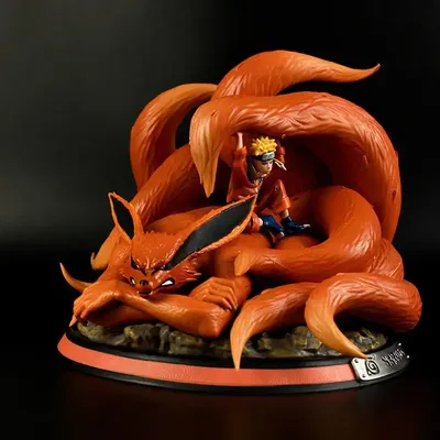 Statue de renard démon et Naruto...