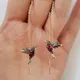 1 paire Unique Long pendants d'oreilles oiseau pendentif gland cristal pendentif boucles d'oreilles