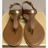 Michael Kors Shoes | Brand New Michael Kors Plate Thong Sandals | Color: Brown | Size: 6