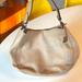 Coach Bags | Coach Glove-Tanned Leather Nomad Hobo In The Color Stone | Color: Cream/Tan | Size: Os