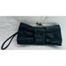 Jessica Simpson Bags | Jessica Simpson Black Bow Clutch Women Small Very Nice With Key Chain Fob | Color: Black | Size: Os