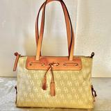 Dooney & Bourke Bags | Dooney & Bourke Shoulder Bag Gold With Tan Leather Details | Color: Gold | Size: Os