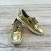 Michael Kors Shoes | Michael Kors Gold Sneakers Size 6 | Color: Cream/Gold | Size: 6