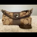 Coach Bags | Coach Canvas Handbag. Zipper Closure. 6 1/2 Inches High; 11 Inches Wide. | Color: Brown/Black | Size: 6 1/2 Inches Tall By 11 Inches Wide