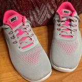 Nike Shoes | Gray And Hot Pink Nike’s (“Free Rn”) | Color: Gray/Pink | Size: 8.5