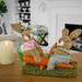 The Holiday Aisle® Two Easter Bunnies on Carrot Seesaw, Wood | 13.8 H x 5.1 W x 9.8 D in | Wayfair 7CDC132A6C3C4DF2B6C95E309D5EF6EF