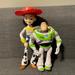 Disney Toys | Lot Of 2 Toy Story Small Figures Jesse With Hat Buzz Lightyear | Color: Tan/Cream | Size: Os