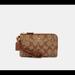 Coach Bags | Coach Double Corner Zip Wristlet In Signature Canvas | Color: Brown/Tan | Size: Os