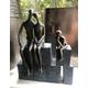 Family of 3 Sculpture Mother Father and Child .Libra Contemporary Family of three sitting on blocks Sculpture in a bronze finish