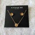 Coach Jewelry | Coach Open Circle Necklace And Tea Rose Stud Set. | Color: Gold | Size: Os