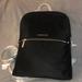 Michael Kors Bags | Brand New Michael Kors Black Vinyl Backpack With Silver Hardware. | Color: Black | Size: 11 1/2 X 14 1/2