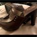 Michael Kors Shoes | Mk Michael Kors Brown Pebble Leather Mules Clogs W/ Wooden Heel & Tassels Sz 6.5 | Color: Brown | Size: 6.5