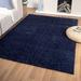 Blue/Navy 87 x 62 x 1 in Area Rug - Red Barrel Studio® Solid Color Power Loom 5' x 7' Area Rug in Navy Polypropylene | 87 H x 62 W x 1 D in | Wayfair