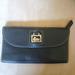 Dooney & Bourke Bags | Dooney And Bourke Leather Clutch/Wallet | Color: Black | Size: Os