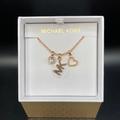 Michael Kors Jewelry | Holiday Drop Michael Kors Rose Gold Charm Necklace | Color: Gold | Size: Os