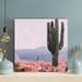 Foundry Select Cactus Plant Beside Orange Leafed Plant - 1 Piece Square Graphic Art Print On Wrapped Canvas in Gray/Green/Pink | Wayfair