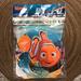 Disney Party Supplies | Finding Nemo Banner Fin-Tastic Fun | Color: Blue/Orange | Size: 8’ 11”