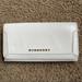 Burberry Bags | Burberry Patent Heritage Grain Penrose Continental Wallet In White | Color: White | Size: Os