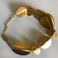 Kate Spade Jewelry | Kate Spade Hammered Gold Metal Petal Bracelet | Color: Gold | Size: 8 ½ “ L