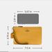 Coach Bags | Coach Small Wristlet / Pebble Leather | Color: Gold/Yellow | Size: Os
