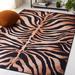Black/Brown 120 x 96 x 0.25 in Indoor Area Rug - Everly Quinn Animal Print Power Loom Polyester Area Rug in Light Orange/Black Polyester | Wayfair