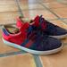Gucci Shoes | Gucci "Ace" Red Blue Metallic Snakeskin Sneakers In A Low Top Style. Size 11. | Color: Blue/Red/White | Size: 11