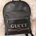Gucci Bags | Gucci Logo Front Pocket Printed Leather Backpack | Color: Black | Size: 15.5hx12wx4.5d