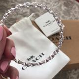 Coach Jewelry | Coach Bracelet, Chain Bangle, New, With Coach Storage Bag And Box | Color: Silver | Size: 2 1/2 X 2 1/2 Inches