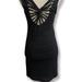 Free People Dresses | Free People - Strappy Back Black Textured Dress Small Sexy Bodycon Lined Nwt | Color: Black | Size: S