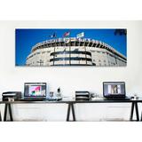 East Urban Home 'Flags in front of a Stadium, Yankee Stadium, New York City, New York' Photographic Print on Canvas Canvas | Wayfair
