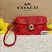 Coach Bags | Coach Legacy 65th Anniversary Flap Wristlet Reddish Orange Euc! | Color: Orange/Red | Size: Os